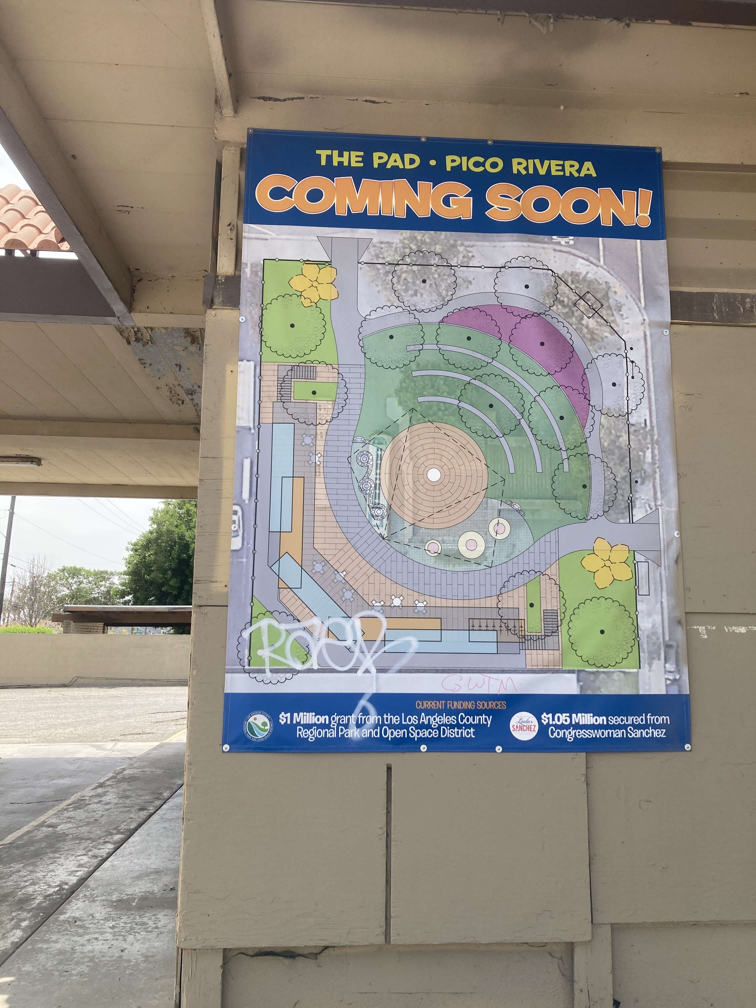 the banner declaring pico's plans to replace the building with a park.